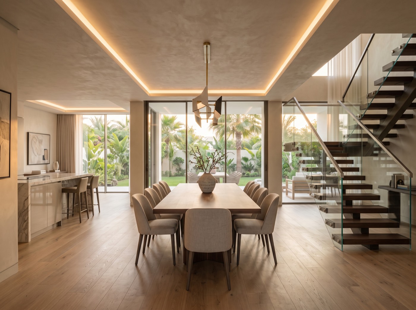 Same villa living room after renovation and extension — open plan, oak floor, garden glazing